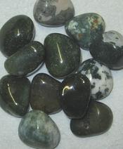 Tumbled green moss agate from Minas Gerais, Brazil and used for crystal healing and jewelry