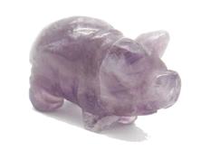 photo of hand carved amethyst pig