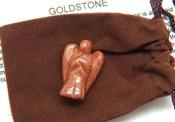 Photo of goldstone carved angel