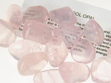 photo of tumbled pink girasol opal crystal healing stone star quartz opalescence from Madagascar